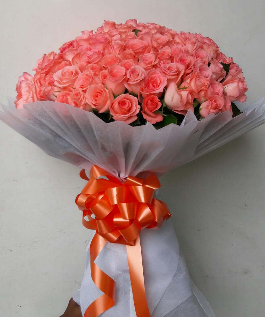 Pink Roses in White Tissue cake delivery Delhi