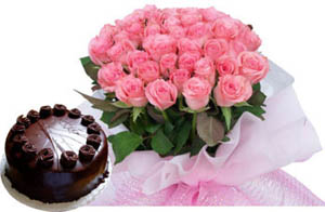 A hand bunch of 25 Red Roses and 1kg chocolate truffle cake cake delivery Delhi